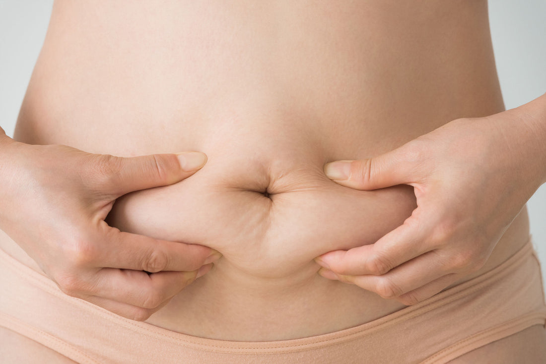 Why Crunches Aren't Flattening Your Mummy Tummy